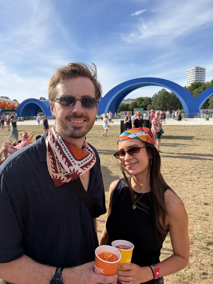 Two friends at a summer festival, one with the scarf at his neck and one wearing it as a headband
