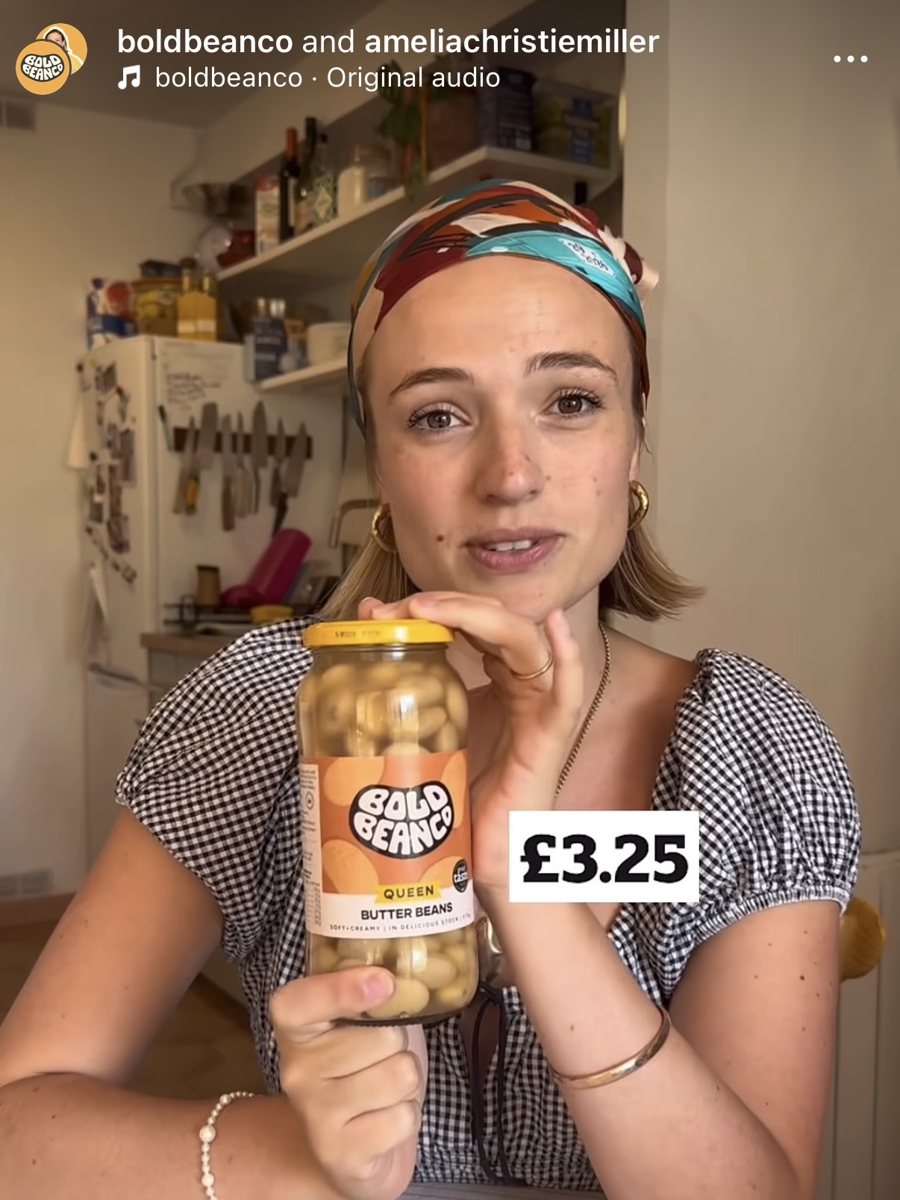 A guest wearing the scarf as a headband in a Bold Bean Co Instagram video